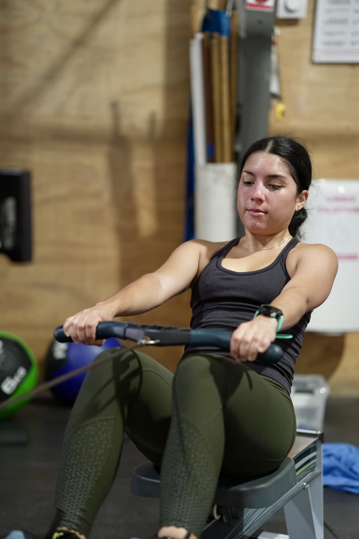 CrossFit Brisbane athlete rowing during conditioning work